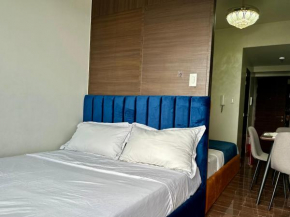 Air residences makati with balcony city lights view